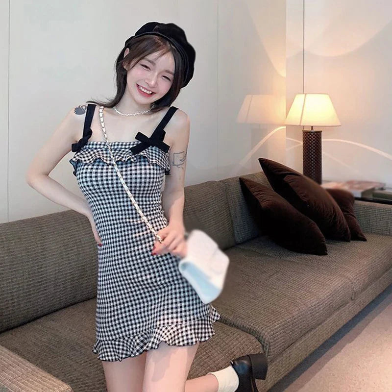 ModeFluisteraar Plaid Halterjurk - Zelfverzekerde Elegantie voor Elke Gelegenheid!