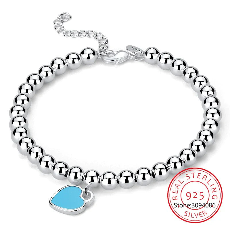 Elegante Zilveren Armband met Hartenkralen en Hartenhanger