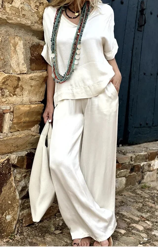 Elegante Witte Top met V-Hals en Wijde Broek