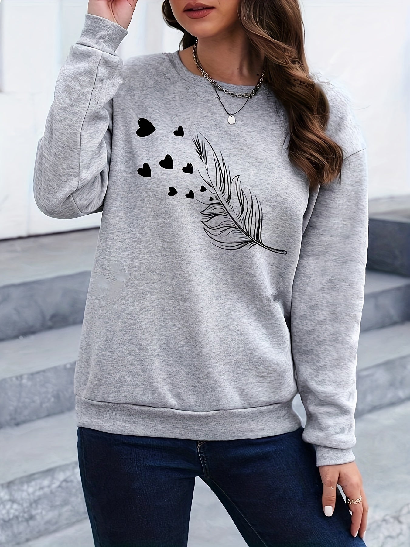 Vrouwelijk Sweatshirt met Verenprint Marisa Casual Stijl