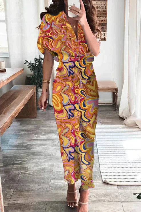 Elegante Bedrukte Jurk met Frenulumgesp en Potloodrok