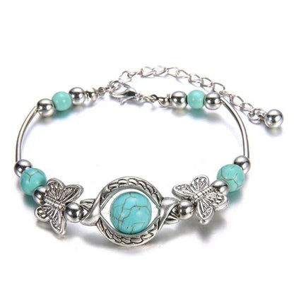 Kralenarmband met Turquoise Vlinder Bedels - Mode Vibes