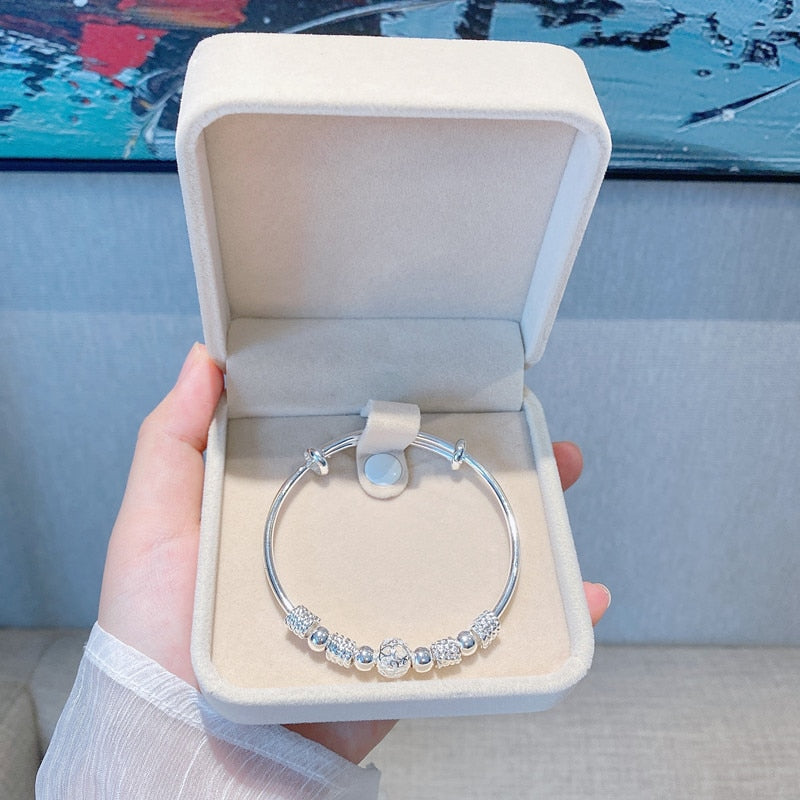 Zilveren Armband met Gelukskralen en Charms