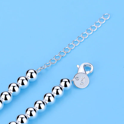 Elegante Zilveren Armband met Hartenkralen en Hartenhanger