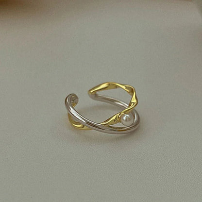 Zilveren Gekruiste Ring met Parel Edelmetaal