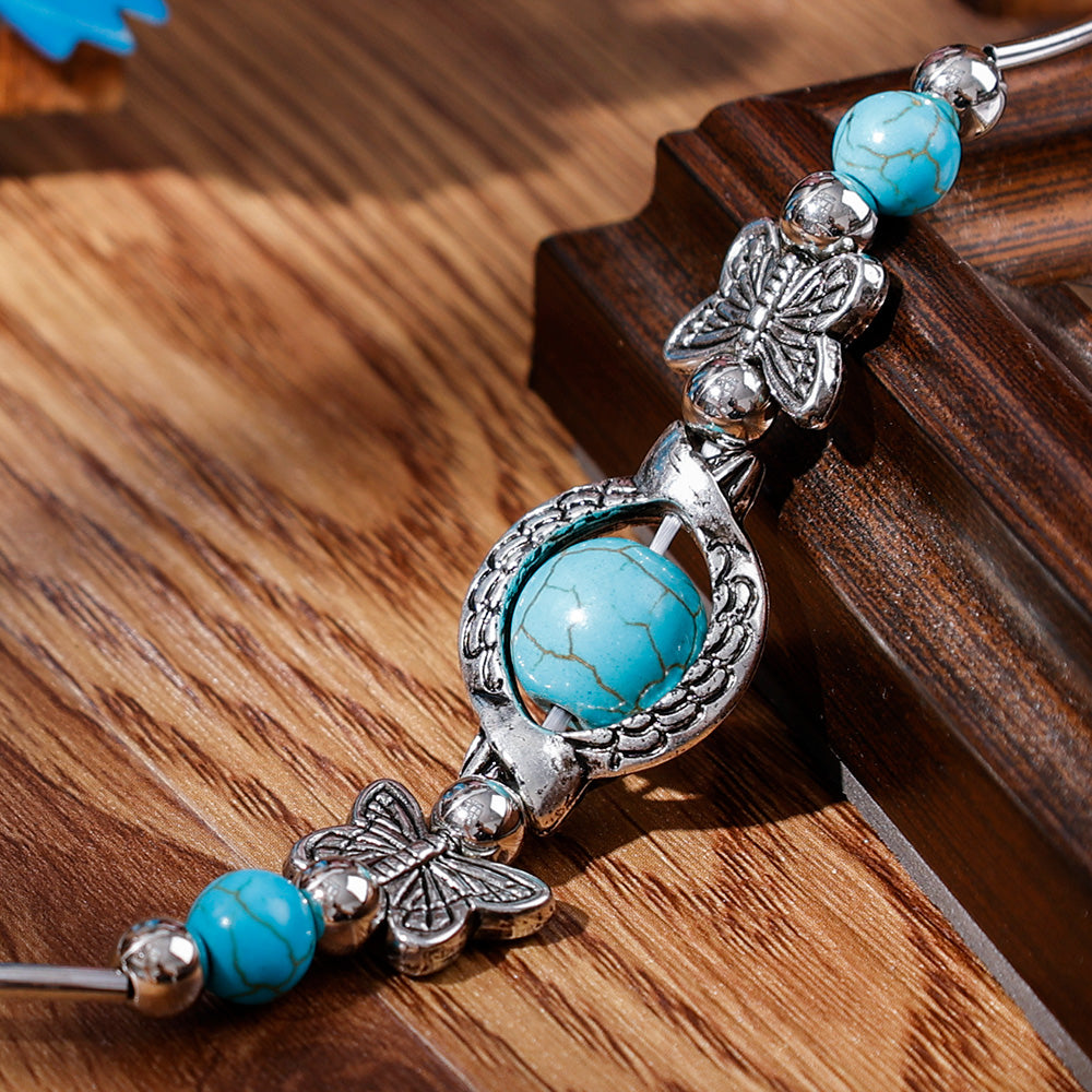 Kralenarmband met Turquoise Vlinder Bedels