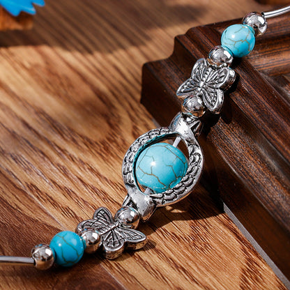 Kralenarmband met Turquoise Vlinder Bedels