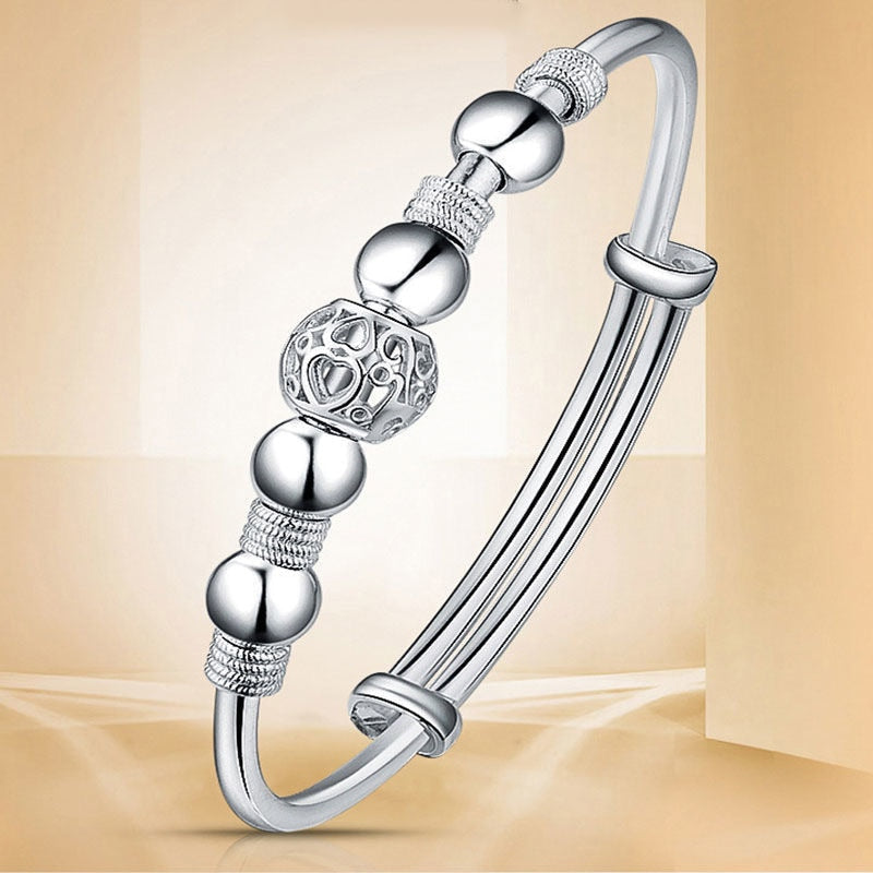 Zilveren Armband met Gelukskralen en Charms