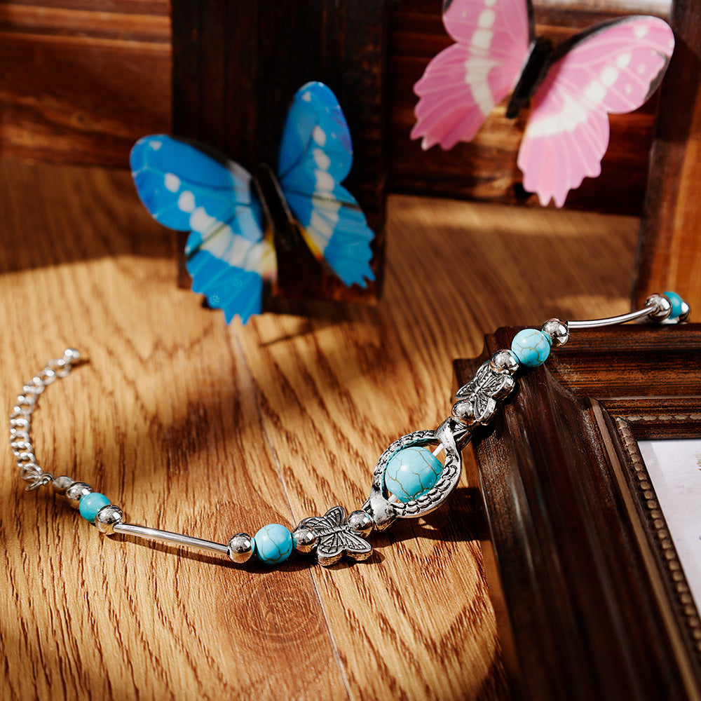 Kralenarmband met Turquoise Vlinder Bedels