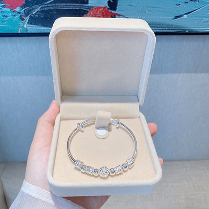 Zilveren Armband met Gelukskralen en Charms