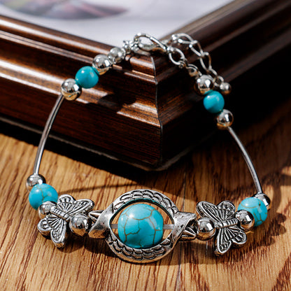 Kralenarmband met Turquoise Vlinder Bedels