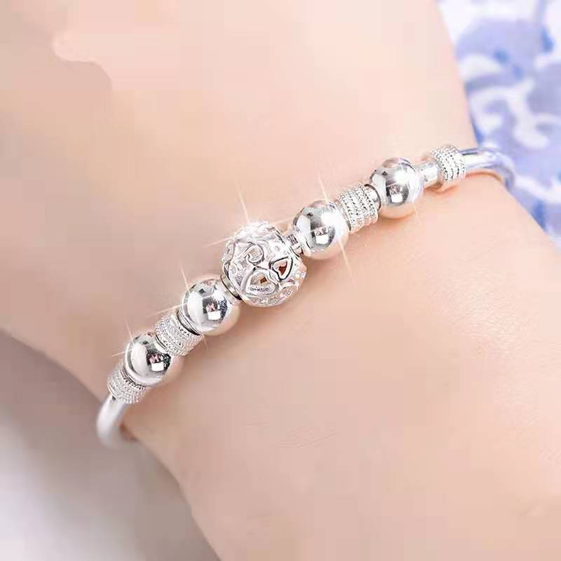 Zilveren Armband met Gelukskralen en Charms