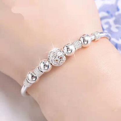Zilveren Armband met Gelukskralen en Charms