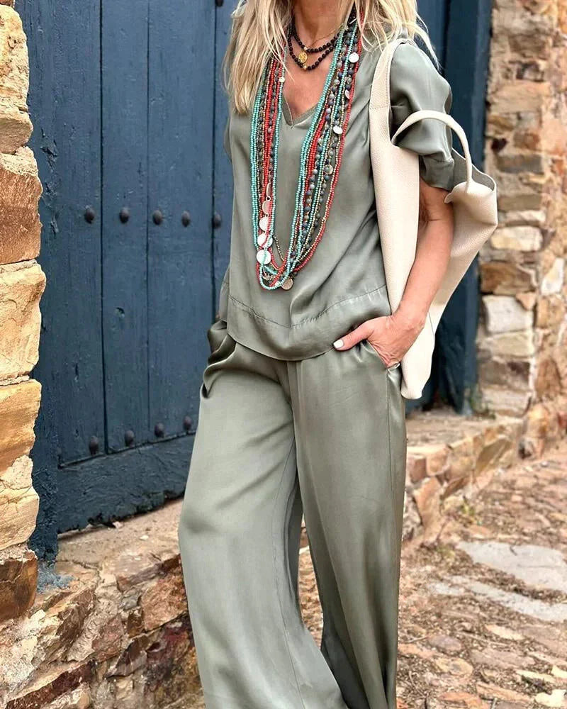 Elegante Witte Top met V-Hals en Wijde Broek