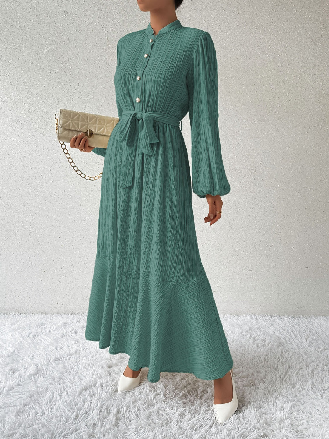 Vrouwelijke Jurk met Lange Mouwen en Taille Accent