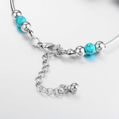 Kralenarmband met Turquoise Vlinder Bedels