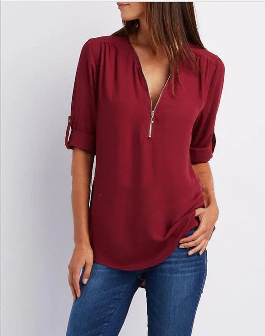 Vrouwelijke Blouse met Halve Rits en Elegante Halslijn