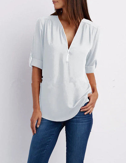 Vrouwelijke Blouse met Halve Rits en Elegante Halslijn