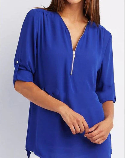 Vrouwelijke Blouse met Halve Rits en Elegante Halslijn