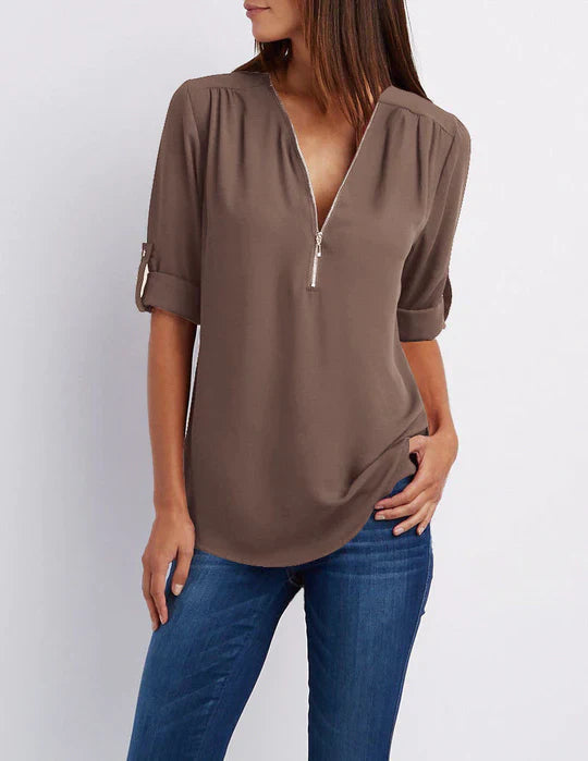 Vrouwelijke Blouse met Halve Rits en Elegante Halslijn