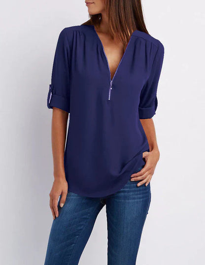 Vrouwelijke Blouse met Halve Rits en Elegante Halslijn