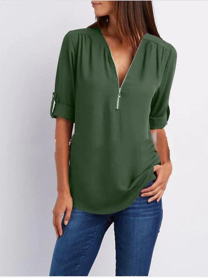 Vrouwelijke Blouse met Halve Rits en Elegante Halslijn