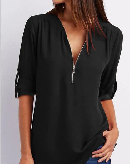 Vrouwelijke Blouse met Halve Rits en Elegante Halslijn