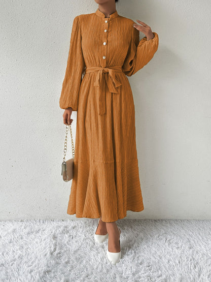 Vrouwelijke Jurk met Lange Mouwen en Taille Accent