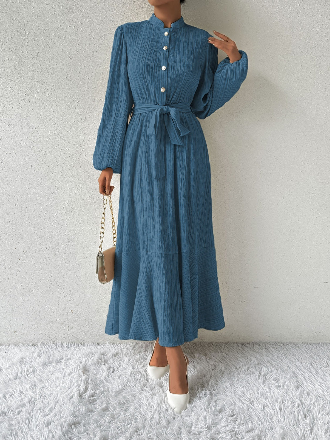 Vrouwelijke Jurk met Lange Mouwen en Taille Accent