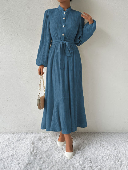 Vrouwelijke Jurk met Lange Mouwen en Taille Accent