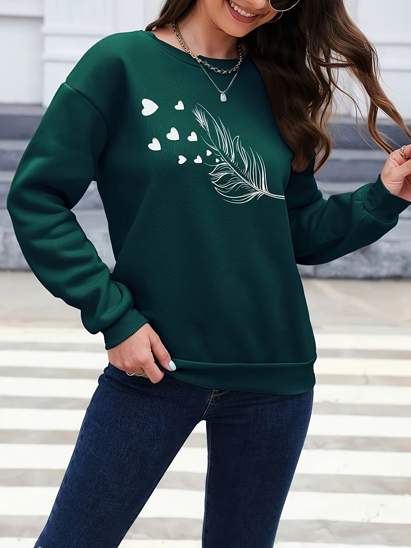 Vrouwelijk Sweatshirt met Verenprint Marisa Casual Stijl