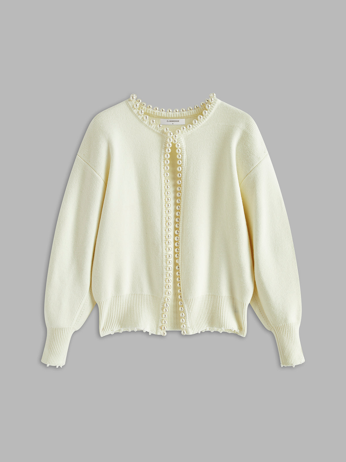Talicia | Cardigan con bordi strappati e perle