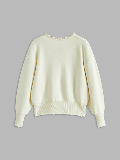 Talicia | Cardigan con bordi strappati e perle