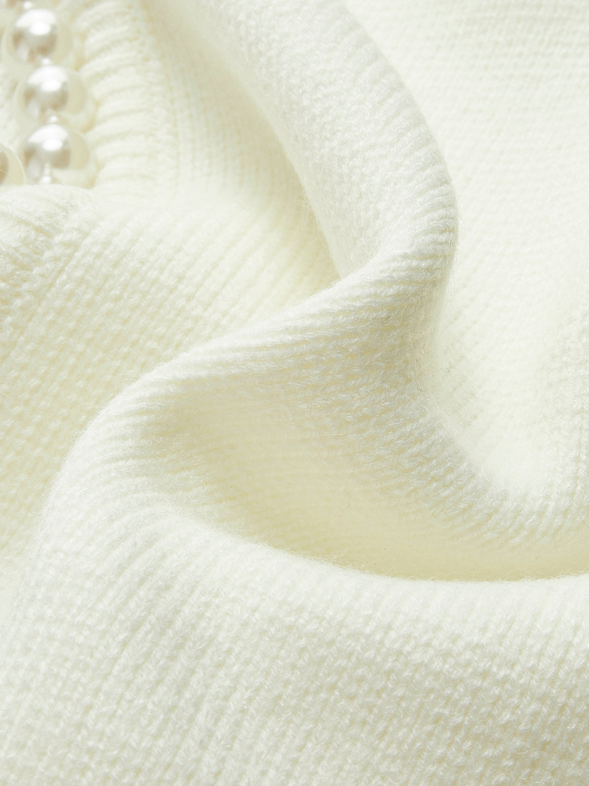 Talicia | Cardigan con bordi strappati e perle