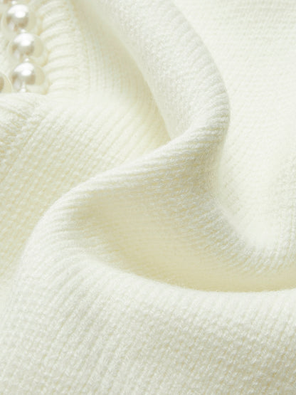 Talicia | Cardigan con bordi strappati e perle