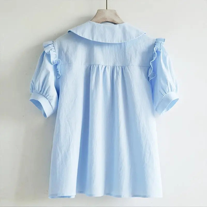 Zachte Blauwe Voorjaarsblouse met Peter Pan Kraag