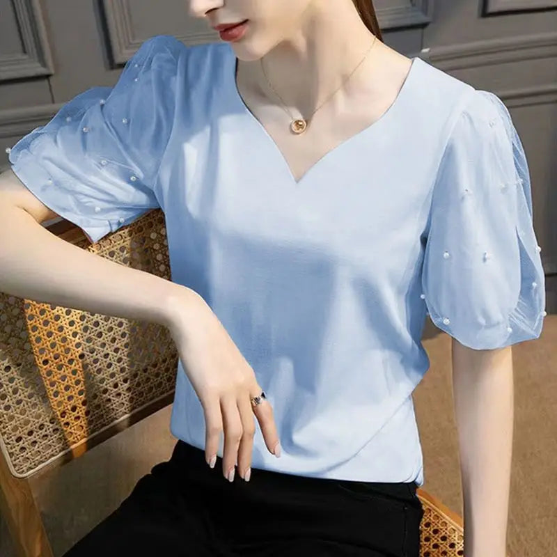 Bellissima Chic Parel Bezaaide Perzik Hart V-Hals Shirt voor de Moderne Vrouw!