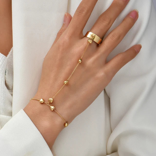 Goudkleurige Sieradenset met Handharnas Detail Elegant