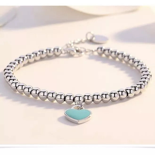 Elegante Zilveren Armband met Hartenkralen en Hartenhanger