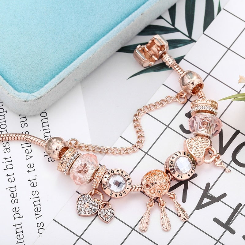 Rosa Armband met Charms en Zilveren Dreamcatcher