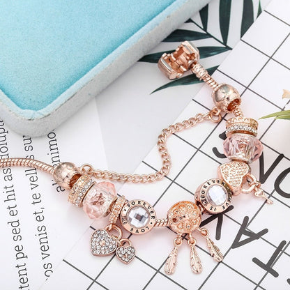 Rosa Armband met Charms en Zilveren Dreamcatcher