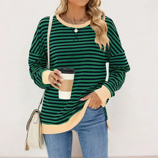 Havello stijlvolle trui met groene en zwarte strepen, afgewerkt met beige boorden. De trui heeft een comfortabele, warme pasvorm en is ideaal voor casual dagen. Perfect te combineren met jeans voor een trendy en moeiteloze look.