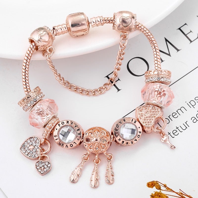 Rosa Armband met Charms en Zilveren Dreamcatcher - Mode Vibes