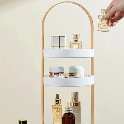 Luneva kosmetiek-organizer met drie lagen en een gouden boogvormig frame. Ideaal voor het overzichtelijk opbergen van parfums, crèmes en huidverzorging. Een chique en praktische toevoeging voor elke kaptafel of badkamer.