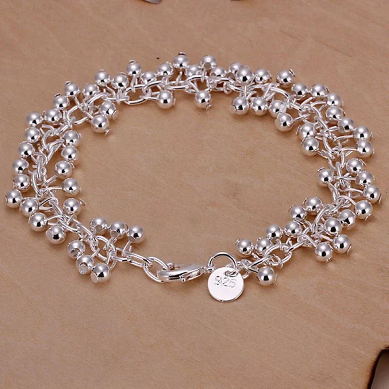 Zilveren Armband met Kralen en Mooie Details