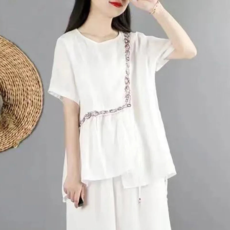 Lente Collectie van Eva: Zomerse Plezier Blouse met Borduurwerk