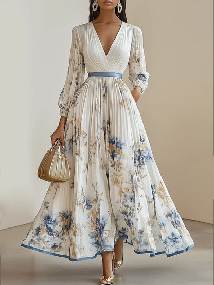 Nora | Maxi-jurk met lange mouwen en bloemenprint 0