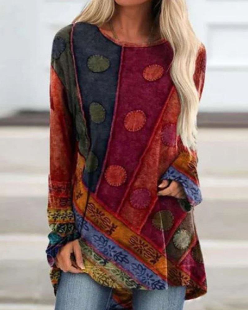 Uniek en kleurrijk Retro topje Topje (Vintage) Comfortabel met een speels patchworkdesign en ronde hals. De losse pasvorm zorgt voor ultiem comfort, terwijl de artistieke patronen en warme tinten een bohemian uitstraling geven. Perfect voor een casual en trendy look.