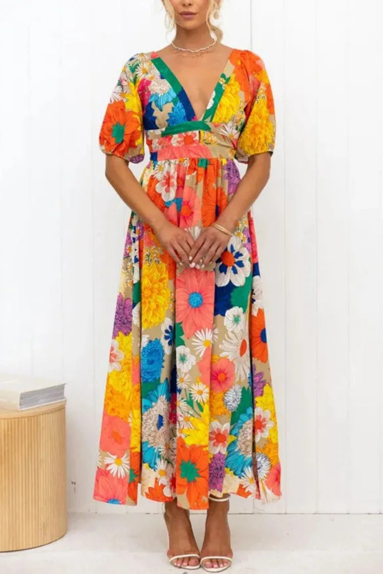 Vrouwelijke Jurk met Pofmouwen en Bloemenprint