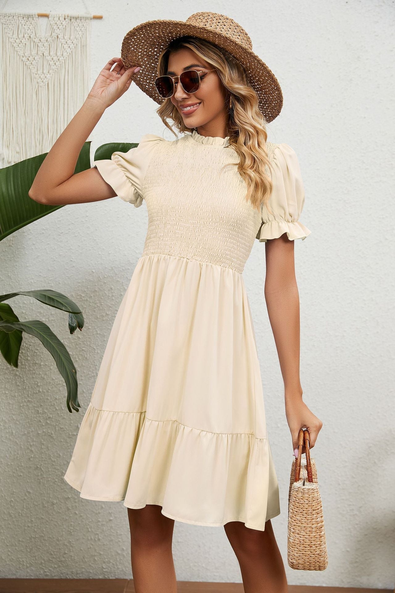 Beige zomerjurk met franjes